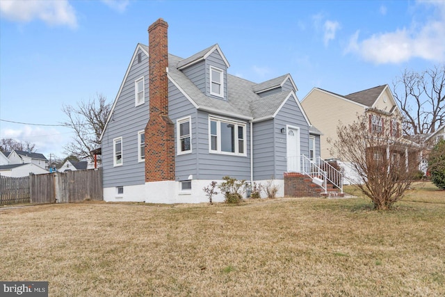 view of front of home with a front lawn