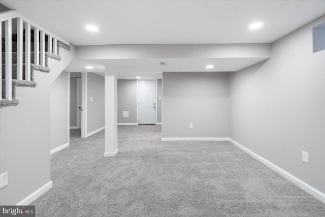 basement featuring carpet floors