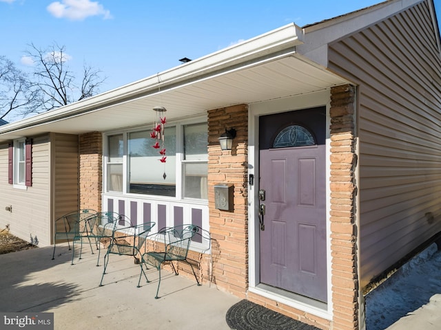 property entrance with a porch