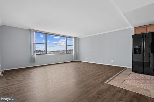 unfurnished living room with light hardwood / wood-style flooring