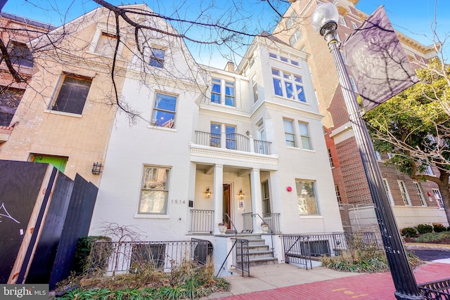 view of front of home featuring central air condition unit