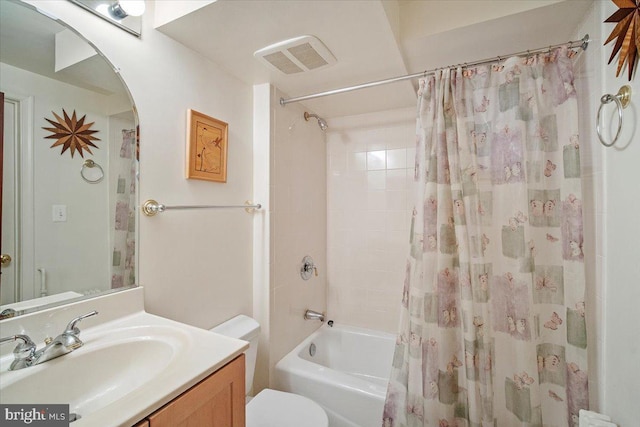 full bathroom featuring vanity, toilet, and shower / bath combo