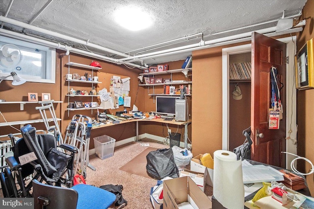 office space with a textured ceiling