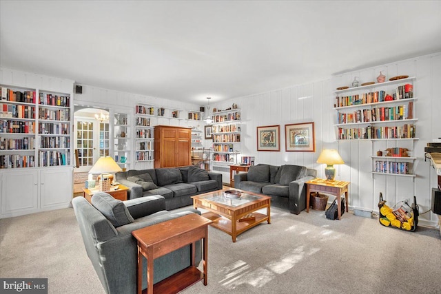 living room featuring light colored carpet