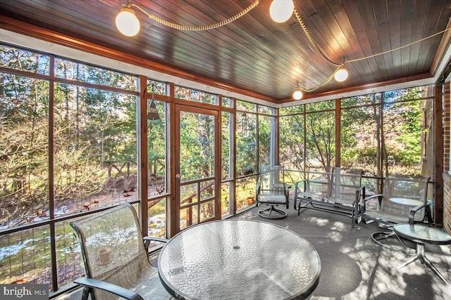 sunroom / solarium with wooden ceiling