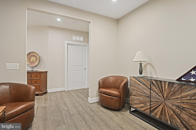 living area featuring light wood-type flooring