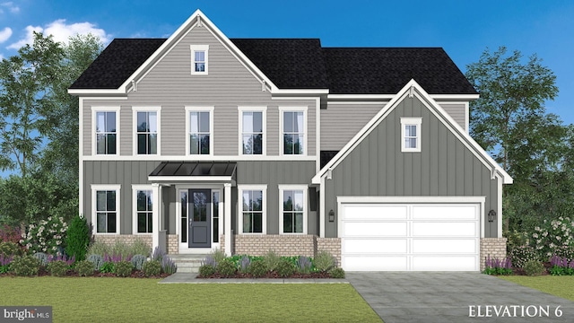 view of front facade with a garage and a front yard