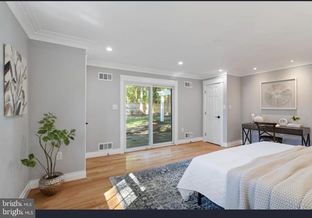 bedroom with ornamental molding, access to outside, and light wood-type flooring