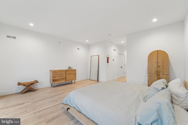 bedroom featuring light hardwood / wood-style floors