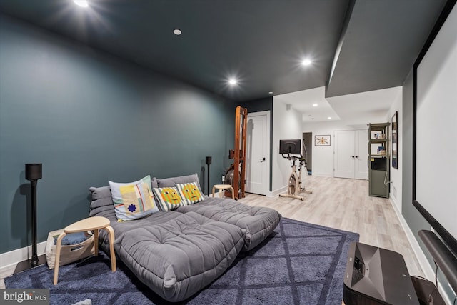 bedroom with light wood-type flooring