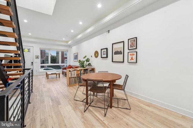 dining area with light wood-type flooring