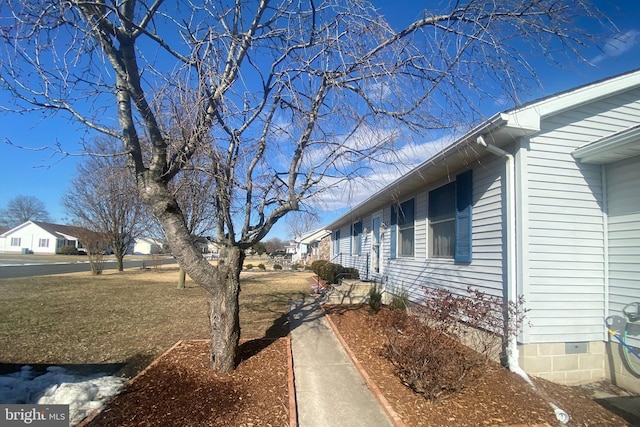 view of home's exterior featuring crawl space