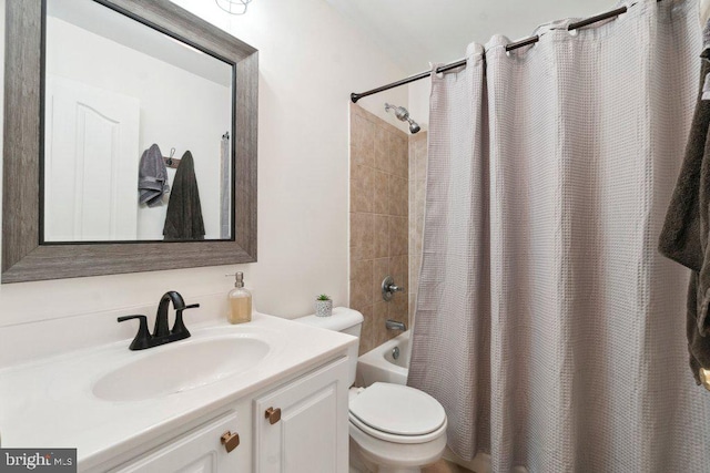 full bathroom featuring vanity, shower / bathtub combination with curtain, and toilet