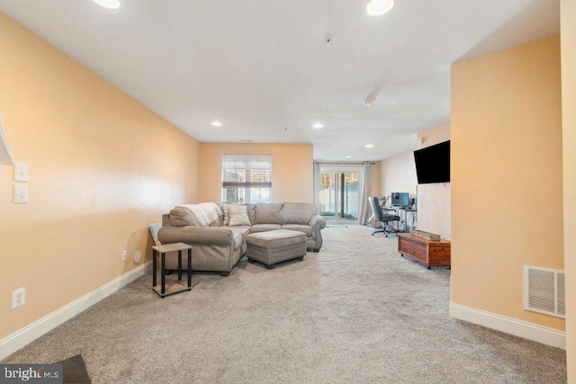 living room featuring carpet floors