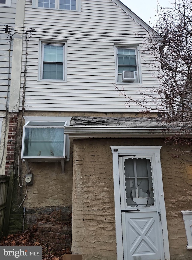 view of property exterior with cooling unit