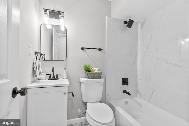 full bathroom with vanity, toilet, and tiled shower / bath combo