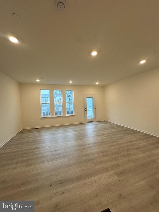 empty room featuring hardwood / wood-style floors