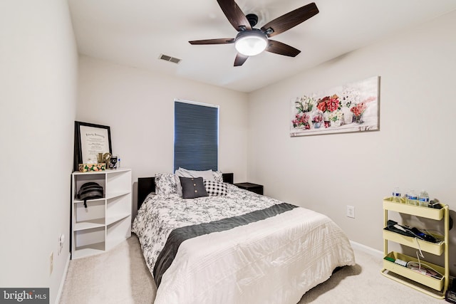 bedroom featuring ceiling fan and carpet floors