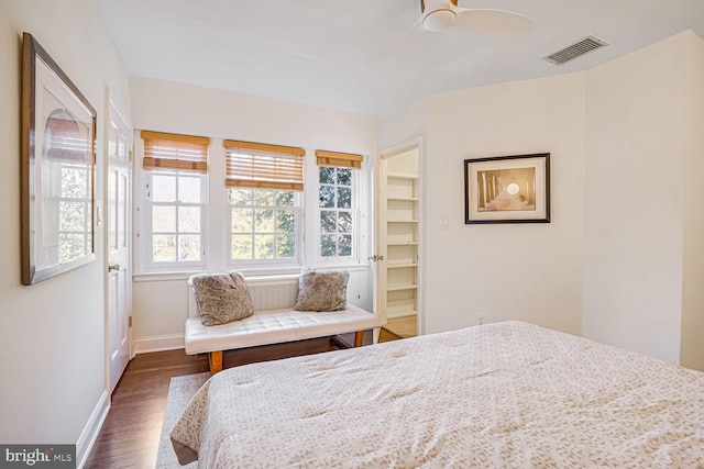 unfurnished bedroom featuring dark wood-type flooring