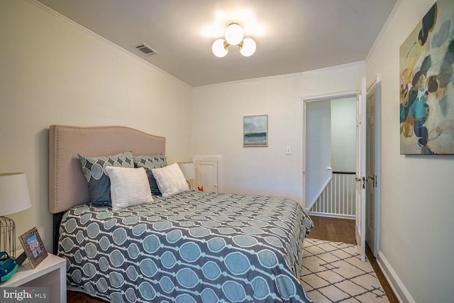 bedroom featuring ornamental molding