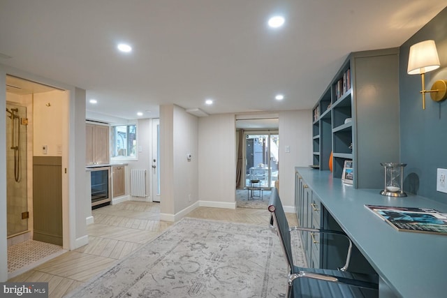 office area with plenty of natural light and light parquet flooring