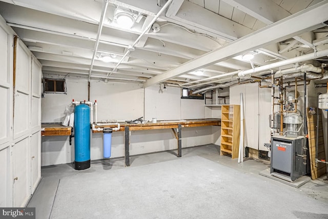 basement with a workshop area