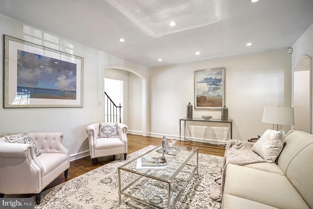 living room with dark hardwood / wood-style floors