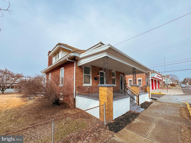 view of front of home featuring covered porch