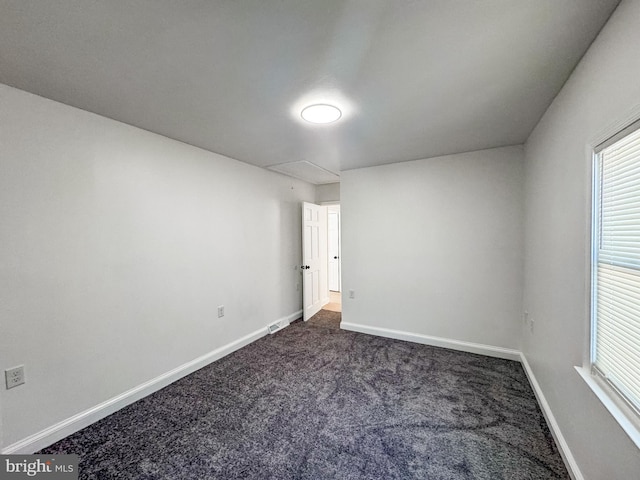 unfurnished room featuring carpet floors