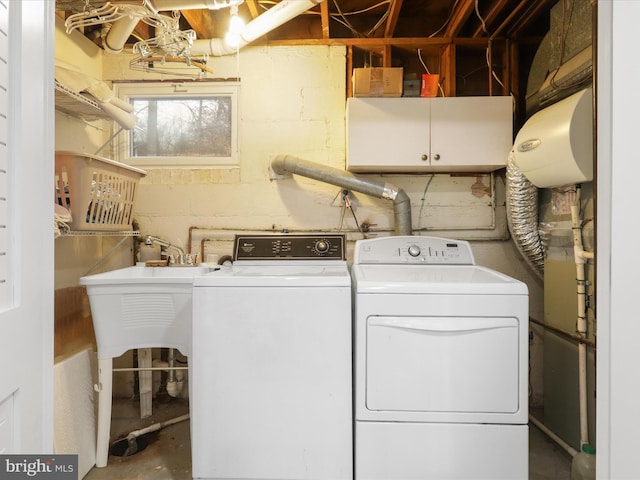 laundry room featuring washing machine and clothes dryer