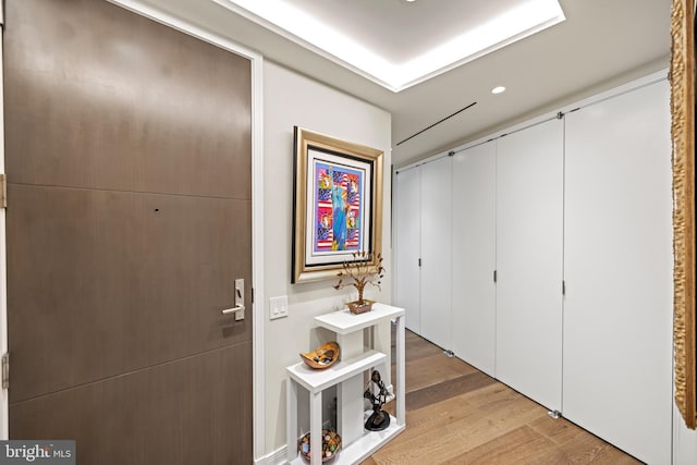 hallway with light wood-type flooring