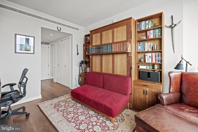 home office featuring dark hardwood / wood-style flooring