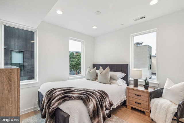 bedroom featuring hardwood / wood-style flooring