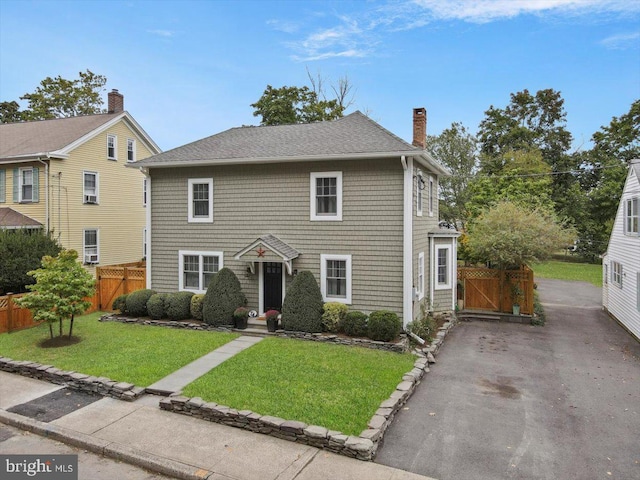 view of front of home with a front yard