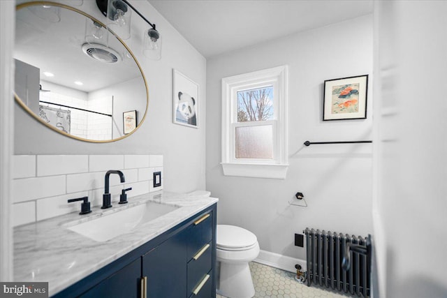 bathroom featuring radiator heating unit, decorative backsplash, vanity, toilet, and a shower with curtain