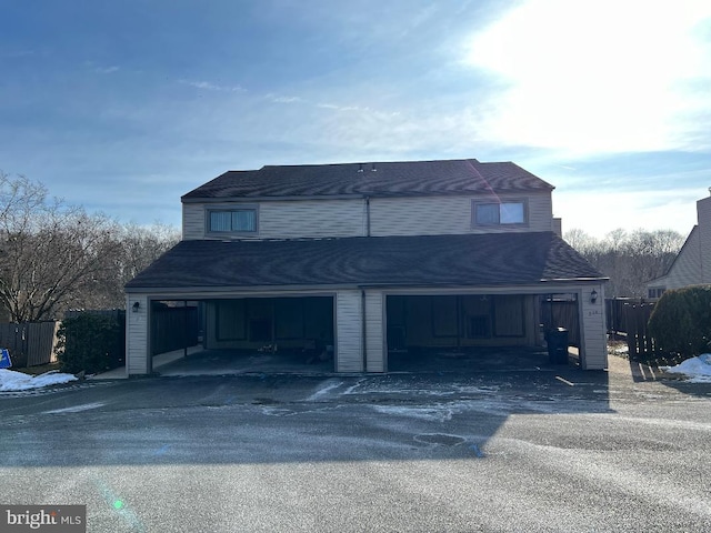 view of front of property with a garage