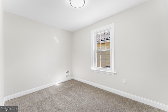 view of carpeted spare room