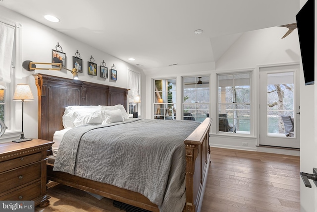 bedroom featuring dark hardwood / wood-style flooring