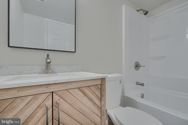 full bathroom featuring vanity, tub / shower combination, and toilet