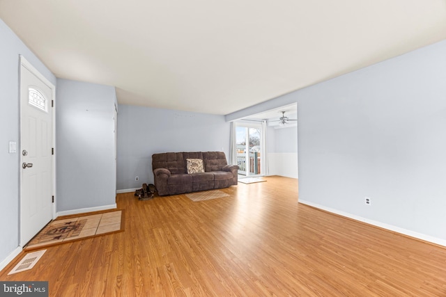 unfurnished living room with light hardwood / wood-style floors