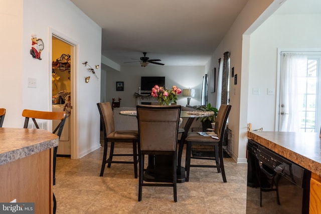 dining room featuring ceiling fan