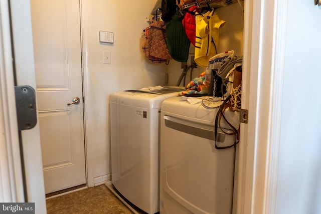 laundry area featuring tile patterned floors and independent washer and dryer