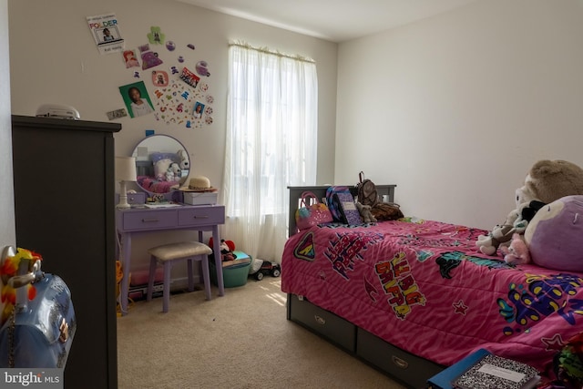 bedroom featuring carpet