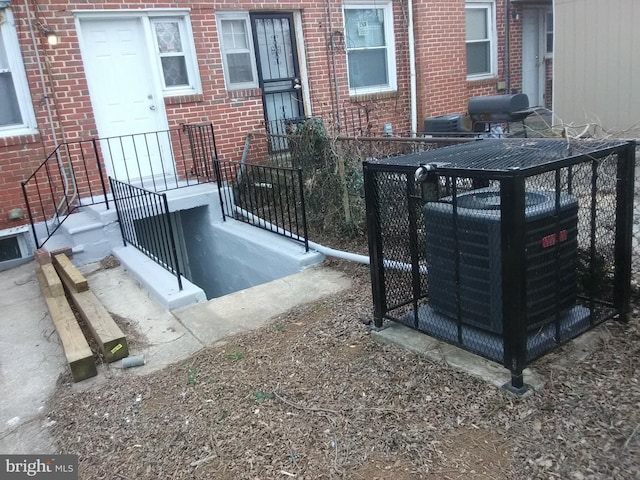 exterior space with cooling unit