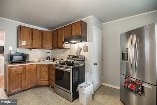 kitchen featuring tasteful backsplash, ornamental molding, stainless steel appliances, and sink