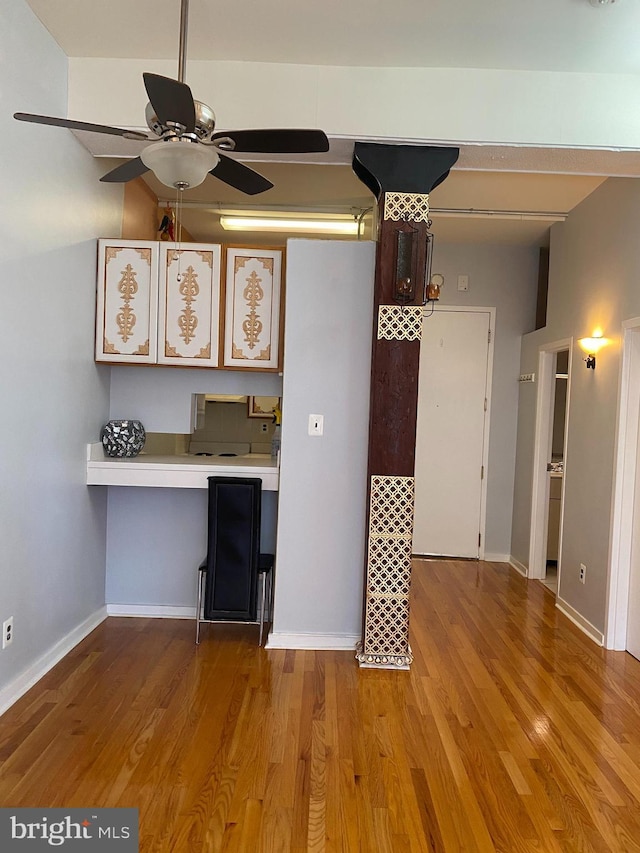 kitchen with light hardwood / wood-style floors and ceiling fan