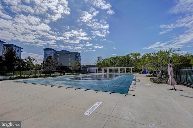 view of pool featuring a patio area