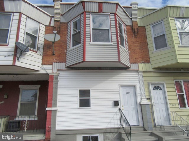 view of front of property with central AC unit