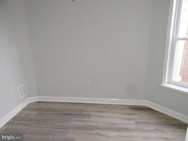 spare room featuring light hardwood / wood-style floors