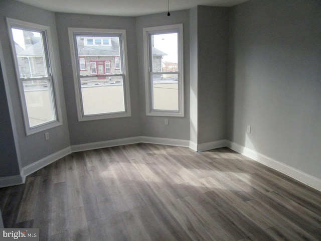 spare room featuring light hardwood / wood-style flooring